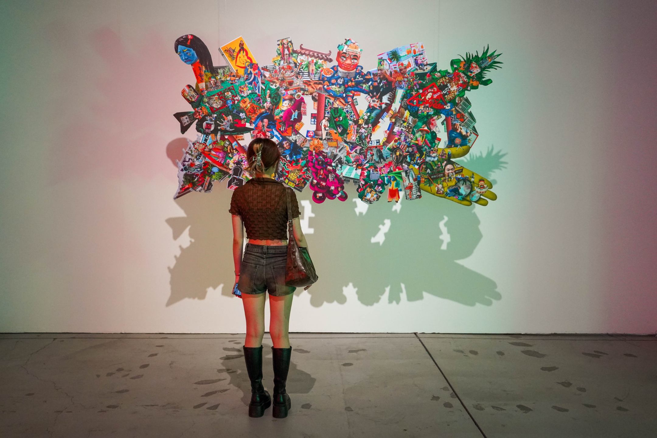 Photomontage installation of Kaohsiung street scene with layered temple imagery